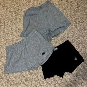 2 grey shorts and 1 black spandex